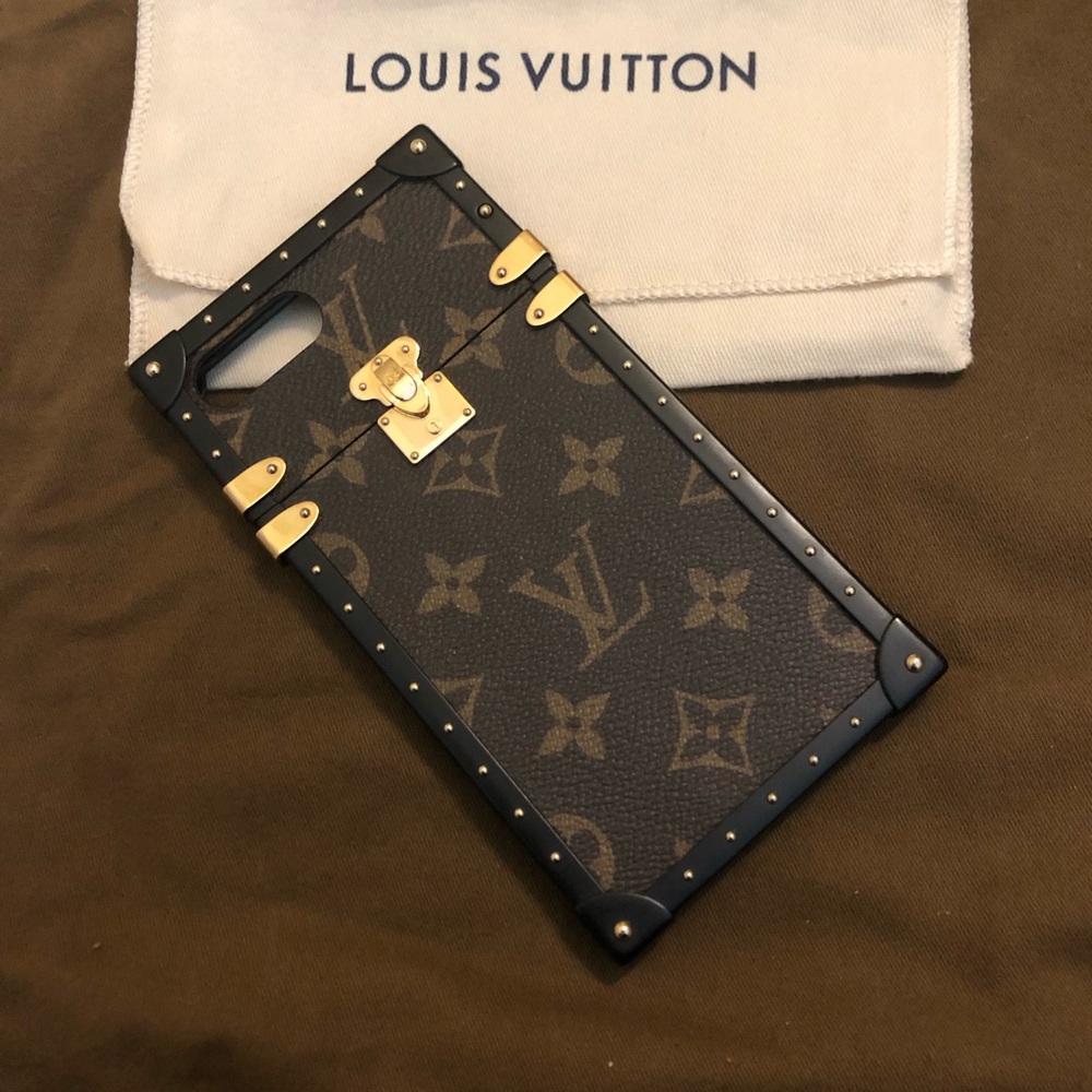 Authentic Louis Vuitton 7+ trunk case with studs